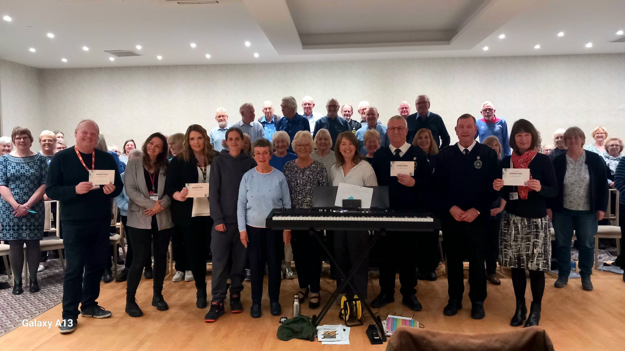 Felixstowe Community Choir presented four charity cheques, bringing the total they have raised since they began in 2013 to £40,900